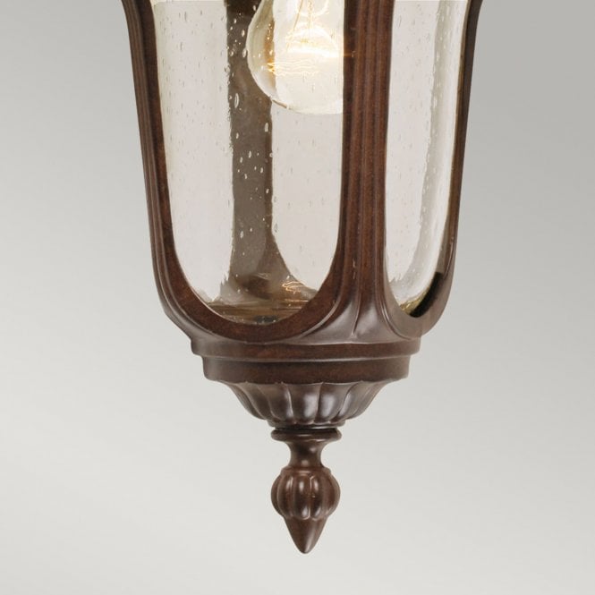 Chicago Wall Down Lantern Small with a rusty bronze patina finish