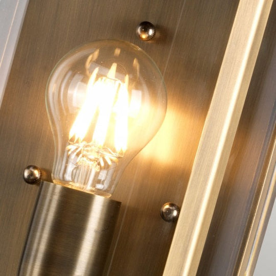 Downing Street Wall Lantern in a Brass finish